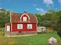 Three-Bedroom Holiday home BrГ¤kne-Hoby with a Fireplace 05 