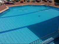 Theos Village Apartments 