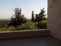 Tzitzifes Stone Mansion 