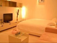 Dongfang Xinghai Yidian Apartment Hotel 