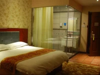 Jiuquan Zhenhao 6+1 Business Hotel 