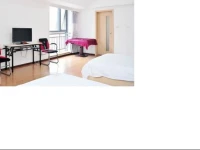 Wanda Junyue Apartment Hotel 
