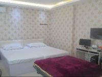 Yulong Woju Hotel 