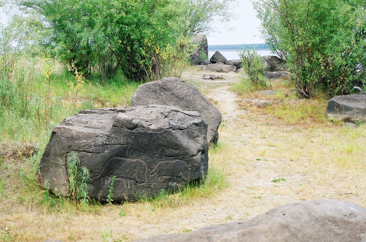 Петроглифы Сикачи-Аляна